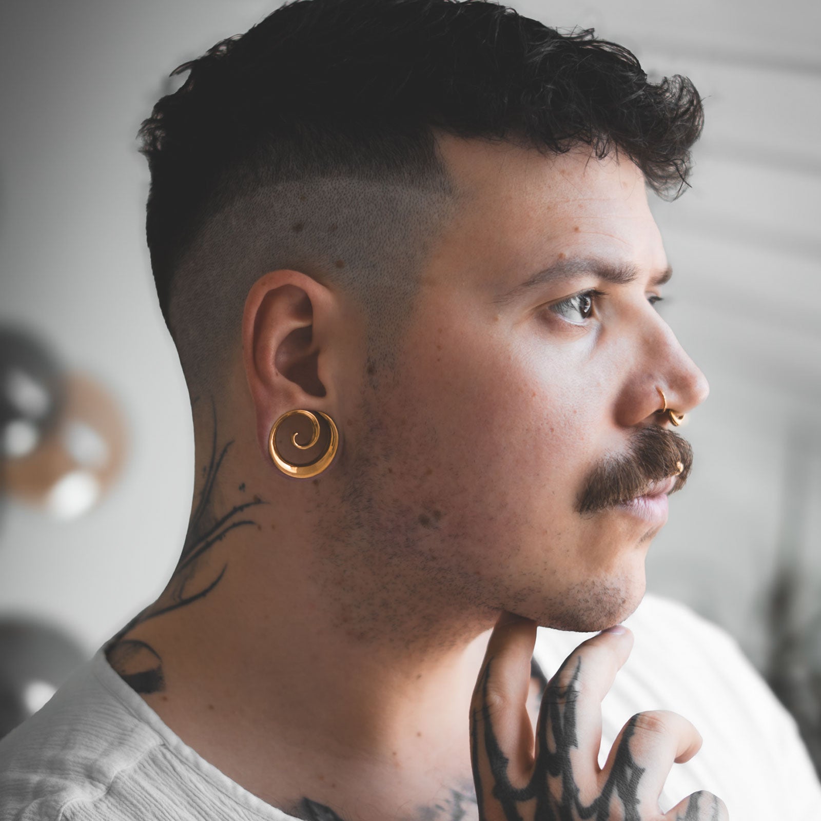 Spiral Gold PVD Saddle Ear Weight Model Shot