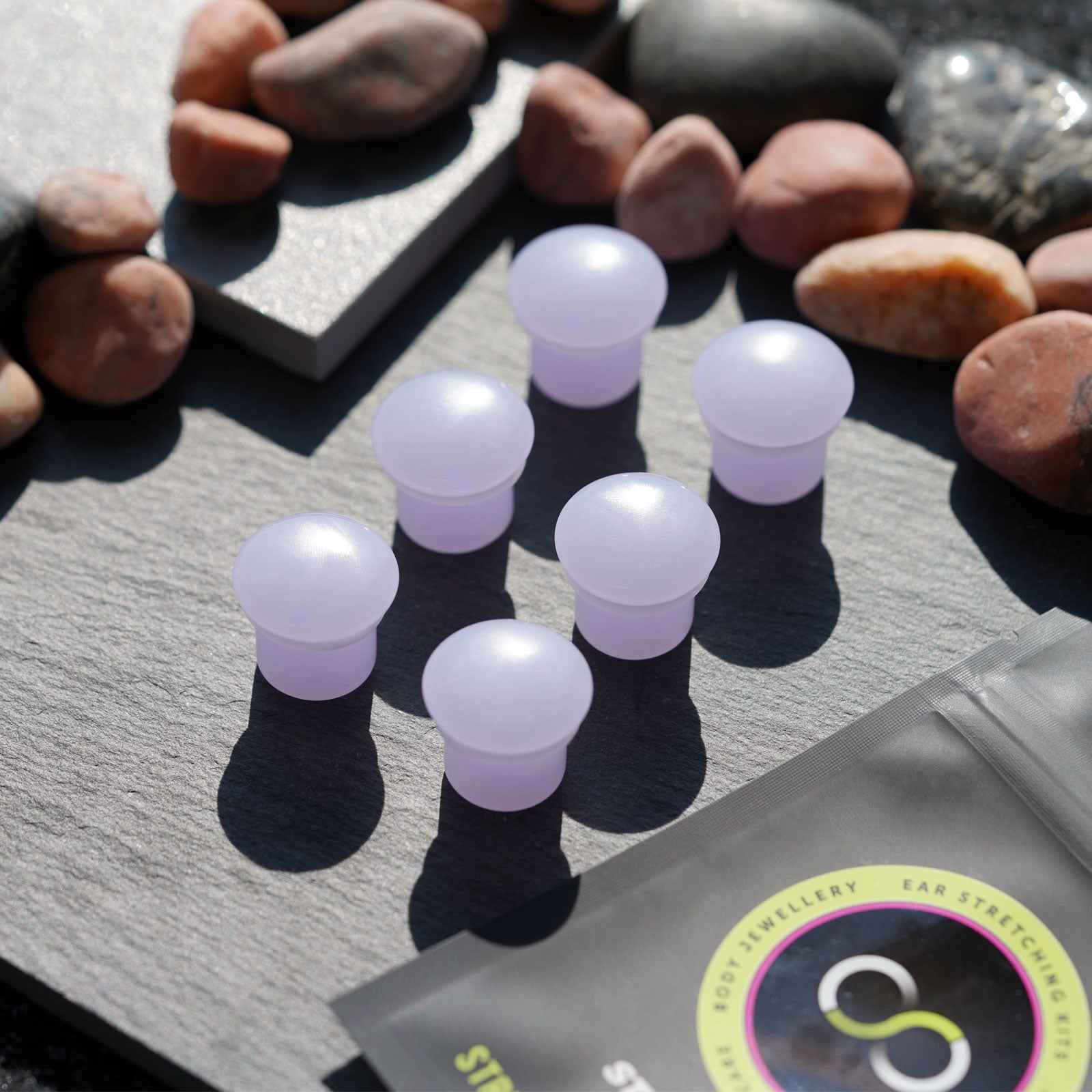 Violet Glass Single Flare Convex Plug Group Shot Two